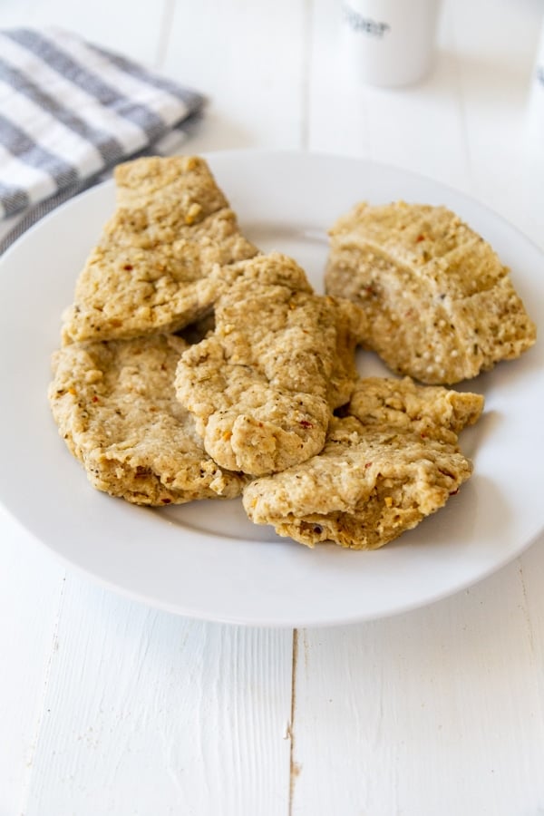 Seitan chicken breasts on a white plate.