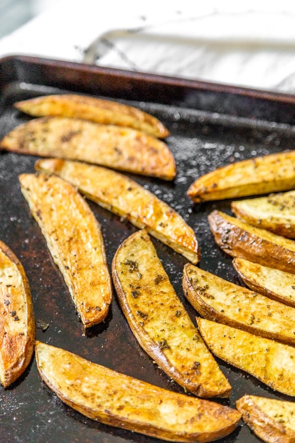 A baking sheet with roasted home fries.