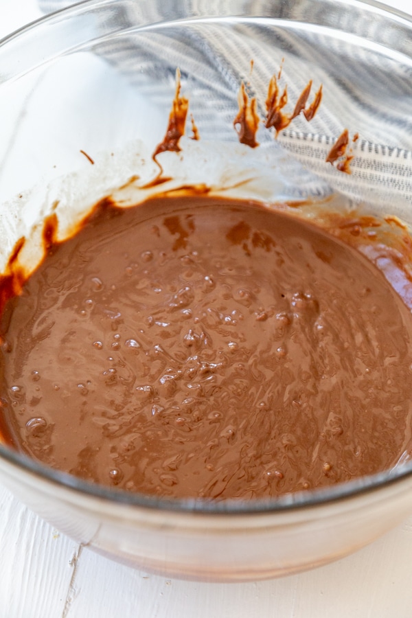 chocolate melted in a glass bowl.