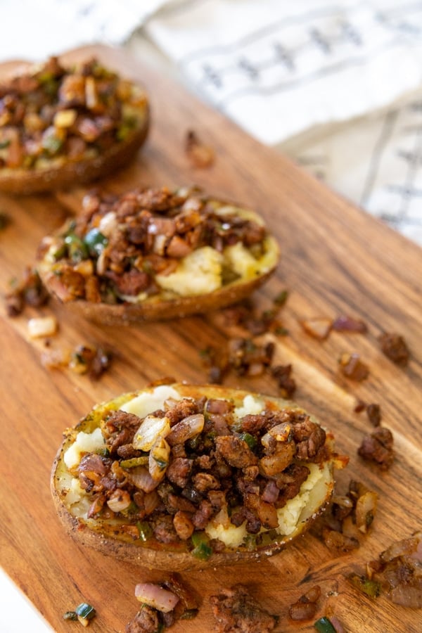 Baked potato skins filled with taco filling.