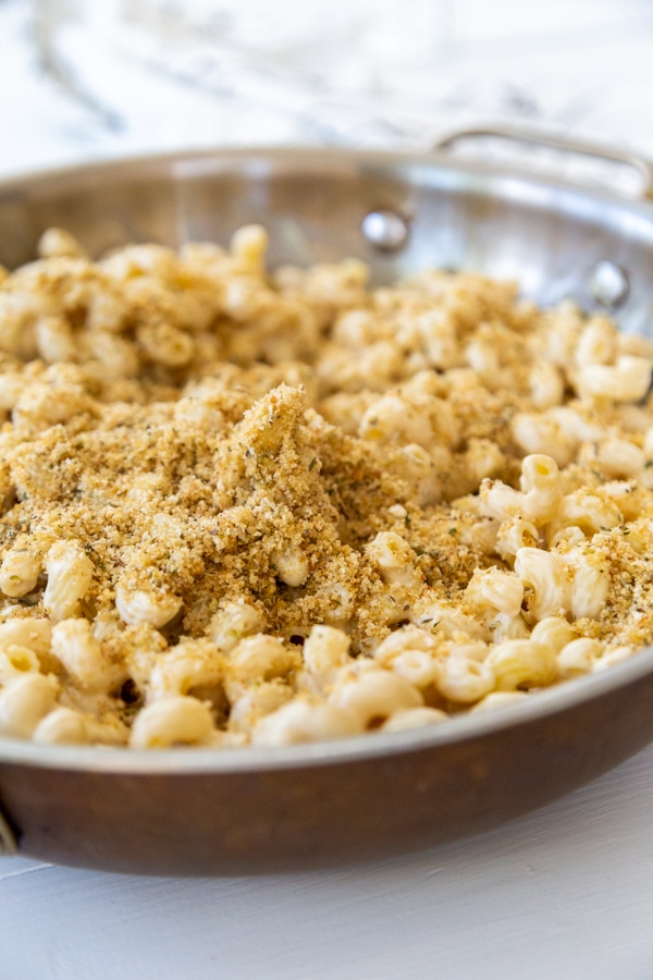 A pan of mac 'n' cheese with a bread crumb topping.