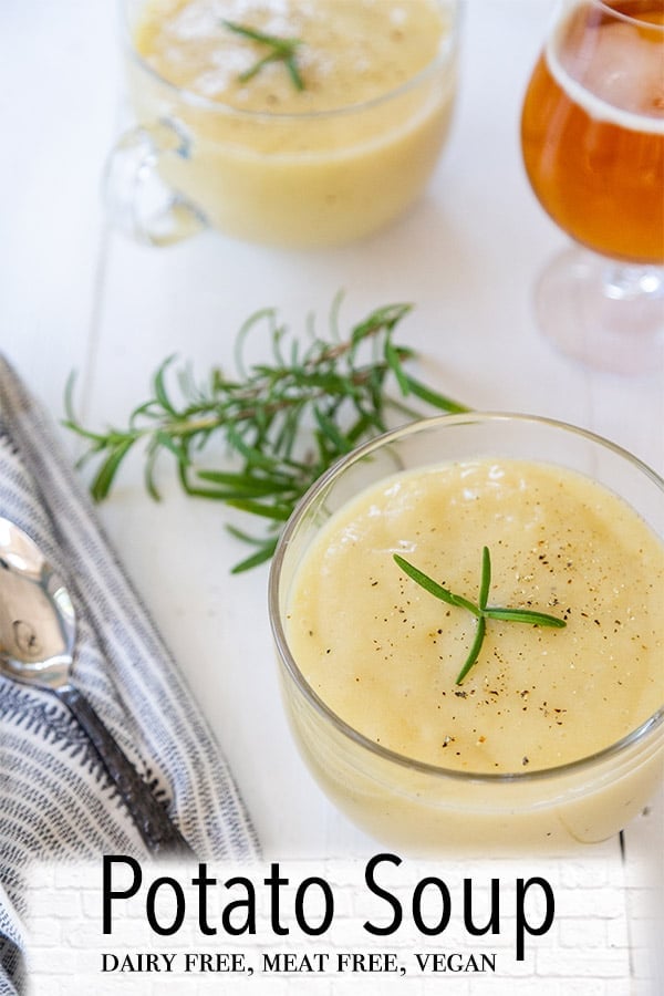 A Pinterest pin for potato soup with 2 mugs of the soup and sprigs of rosemary.