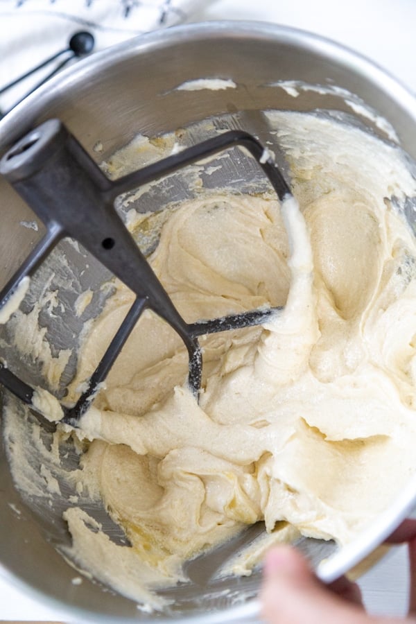 A mixing bowl with whipped butter and sugar.