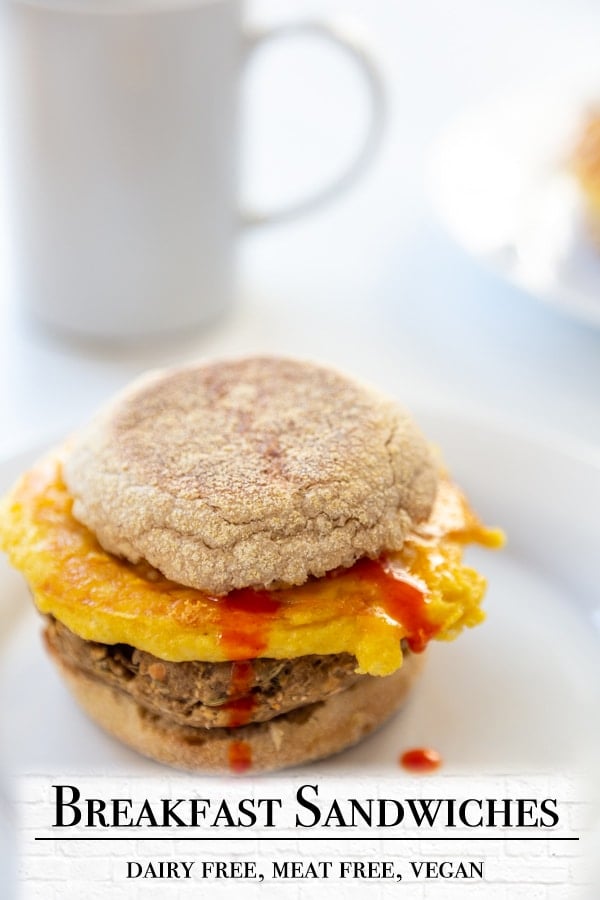 A PInterest pin for a vegan egg and sausage breakfast sandwich with a picture of the sandwich.