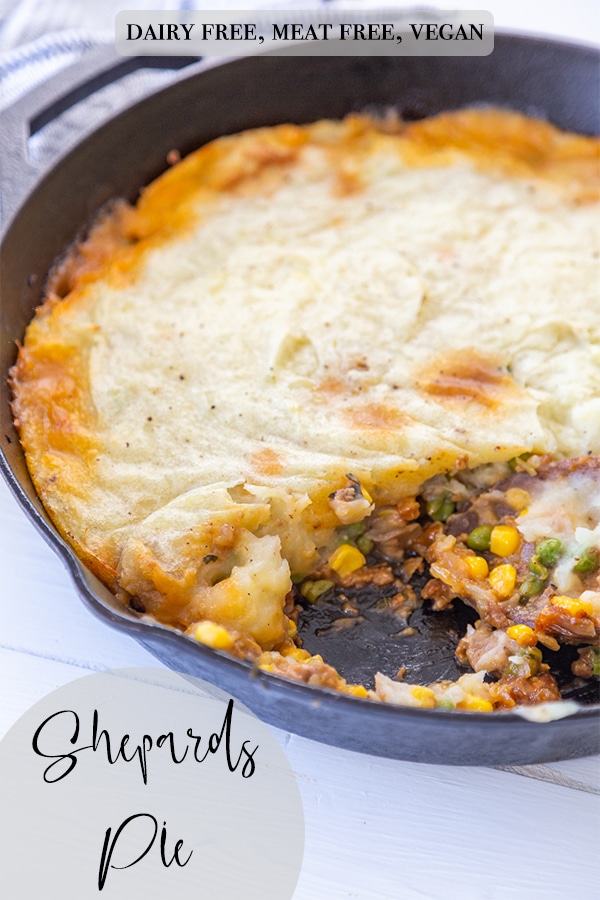 A PInterest pin for vegan sheperd's pie with a picture of the pie in an iron skillet. 