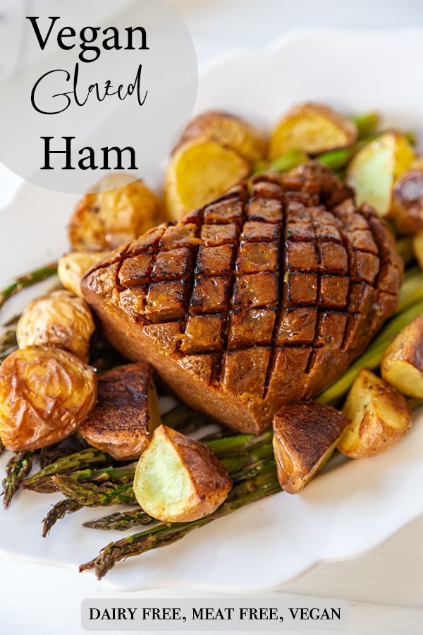 A Pinterest pin for vegan ham with a picture of the ham, asparagus, and potatoes. 