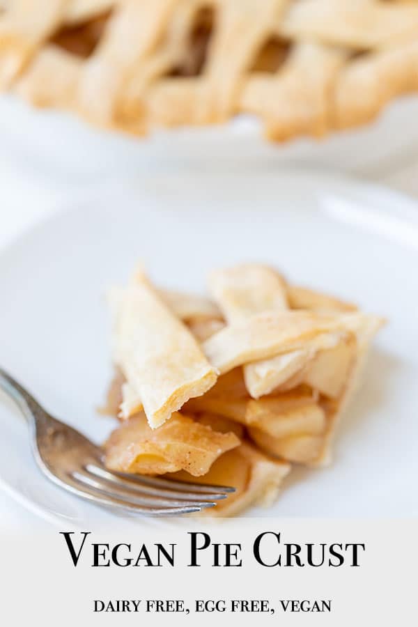 A Pinterest pin for a vegan pie crust with a picture of a slice of apple pie with a lattice crust.
