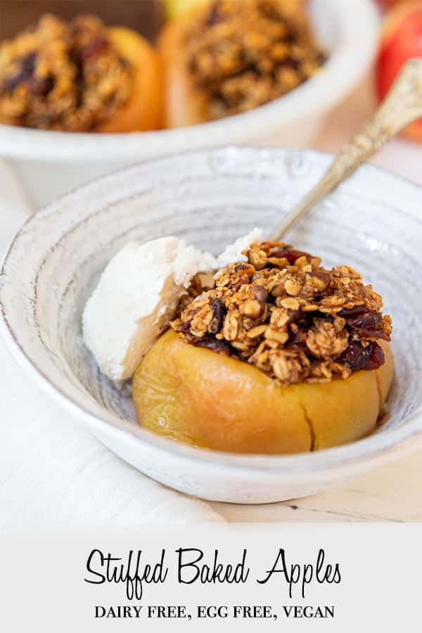 A Pinterest pin for stuffed baked apples with a picture of a baked apple in a white dish with vanilla ice cream on the side.