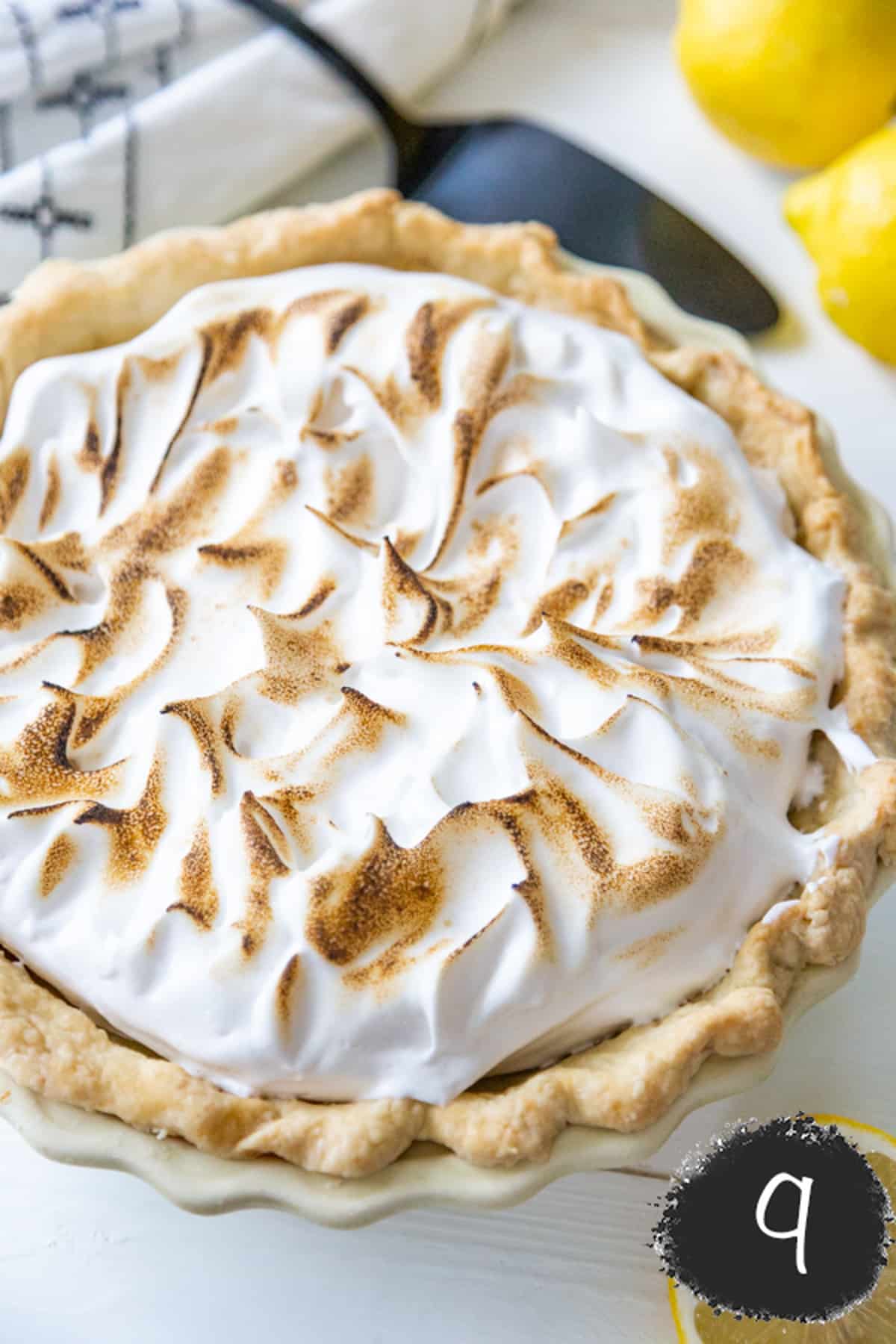 A vegan lemon meringue pie with torched meringue.