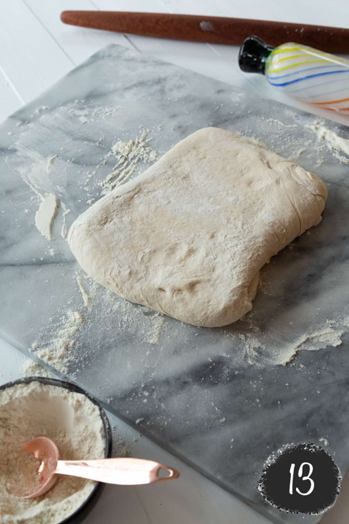 A block of croissant dough and butter.