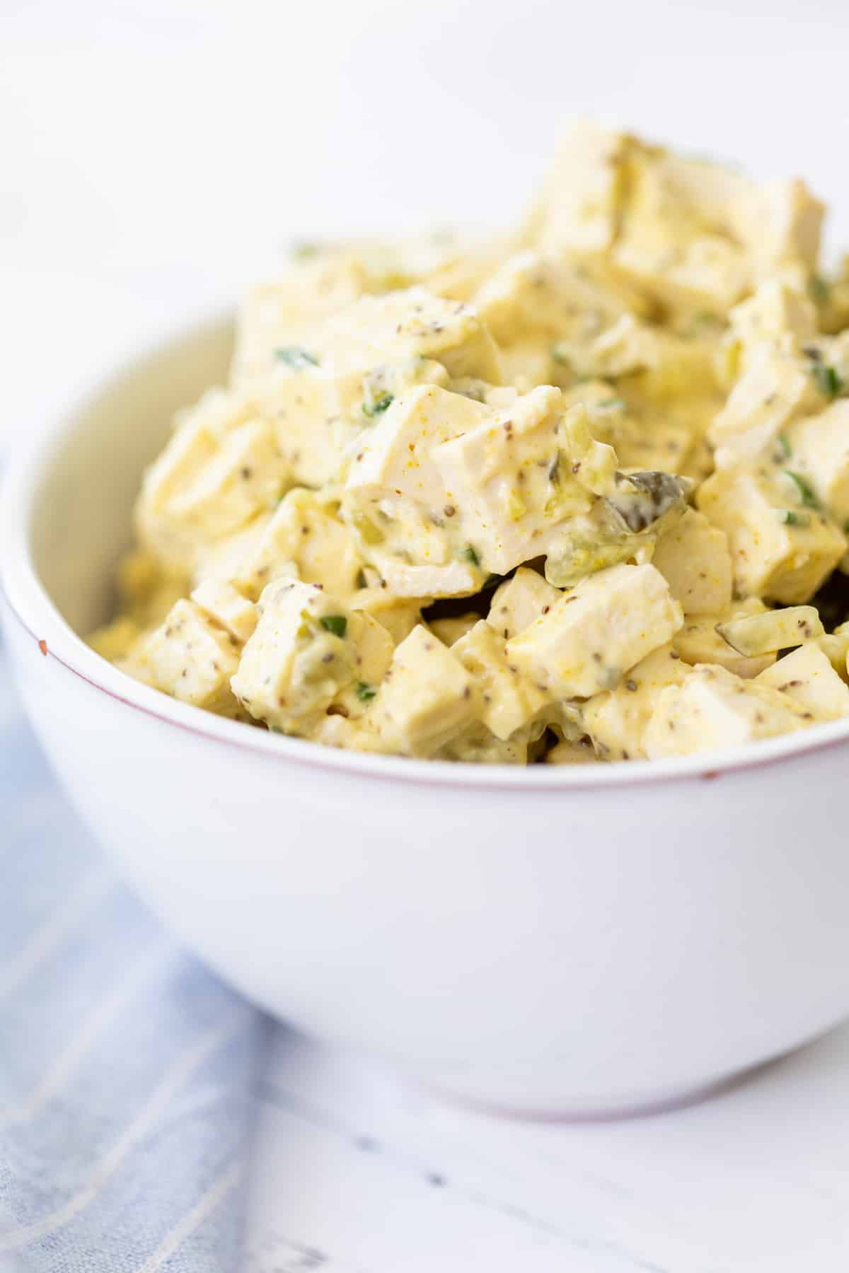 Eggless Tofu Salad in a white bowl.