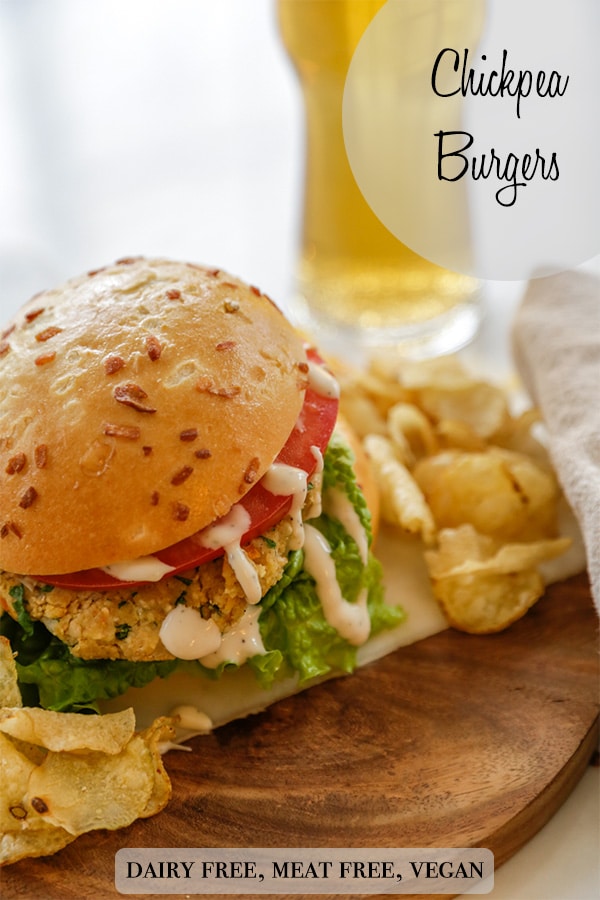 A Pinterest pin for chickpea burgers with a picture of the chickpea burger and chips.
